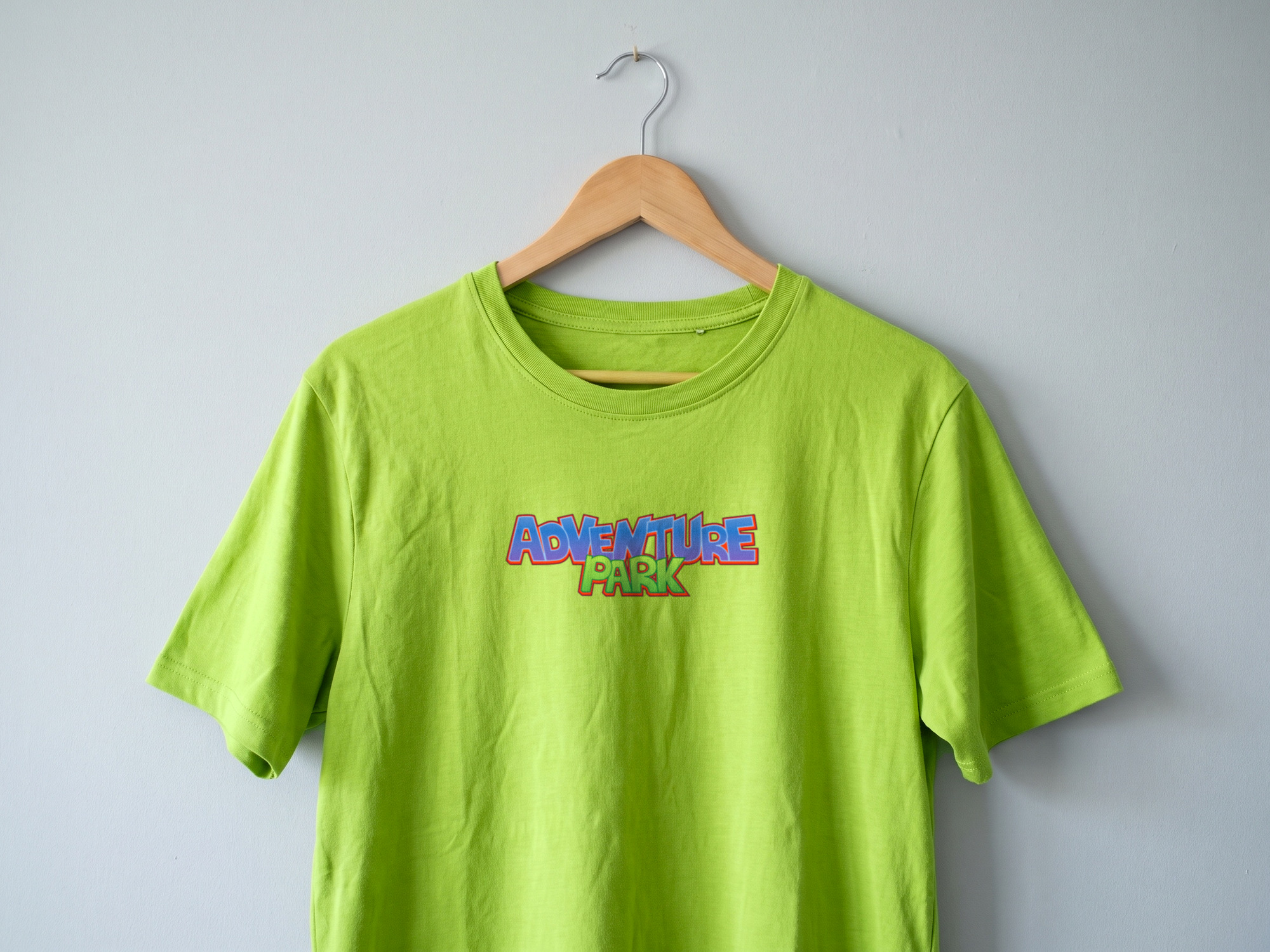 The lime tee with the logotype on the chest