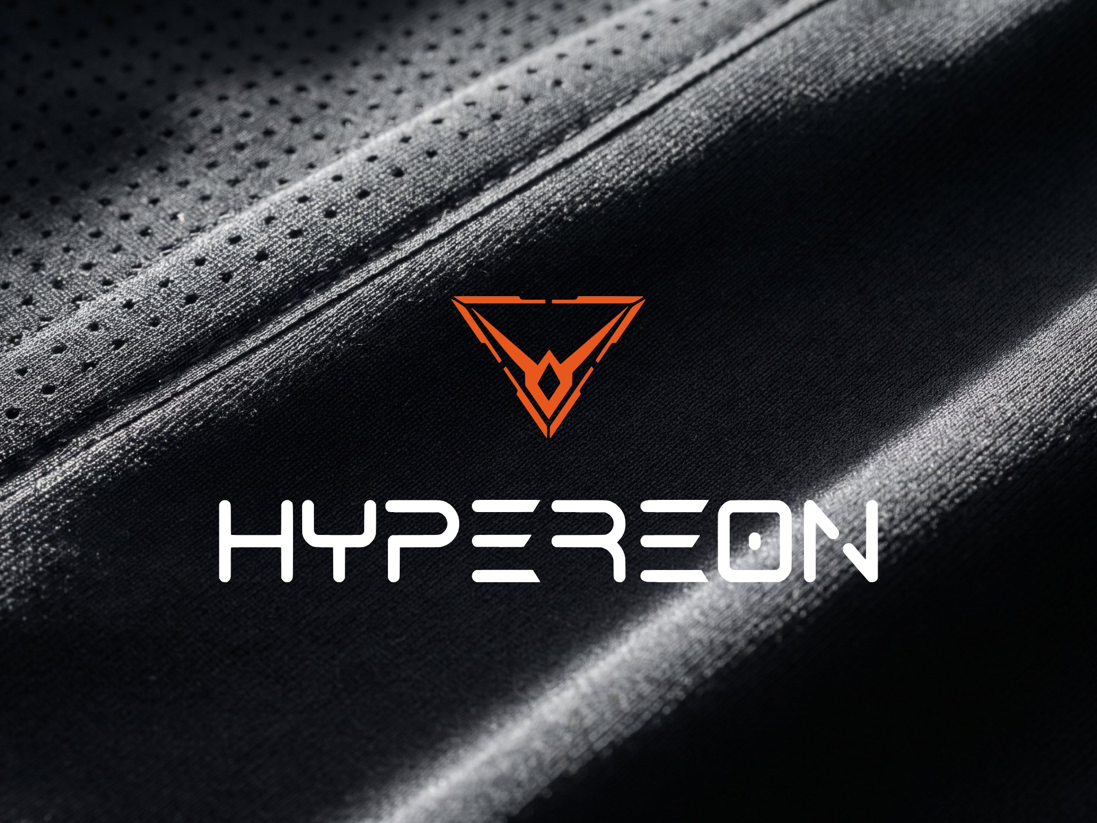 A render of the orange Hypereon mark and the white wordmark on black technical knit