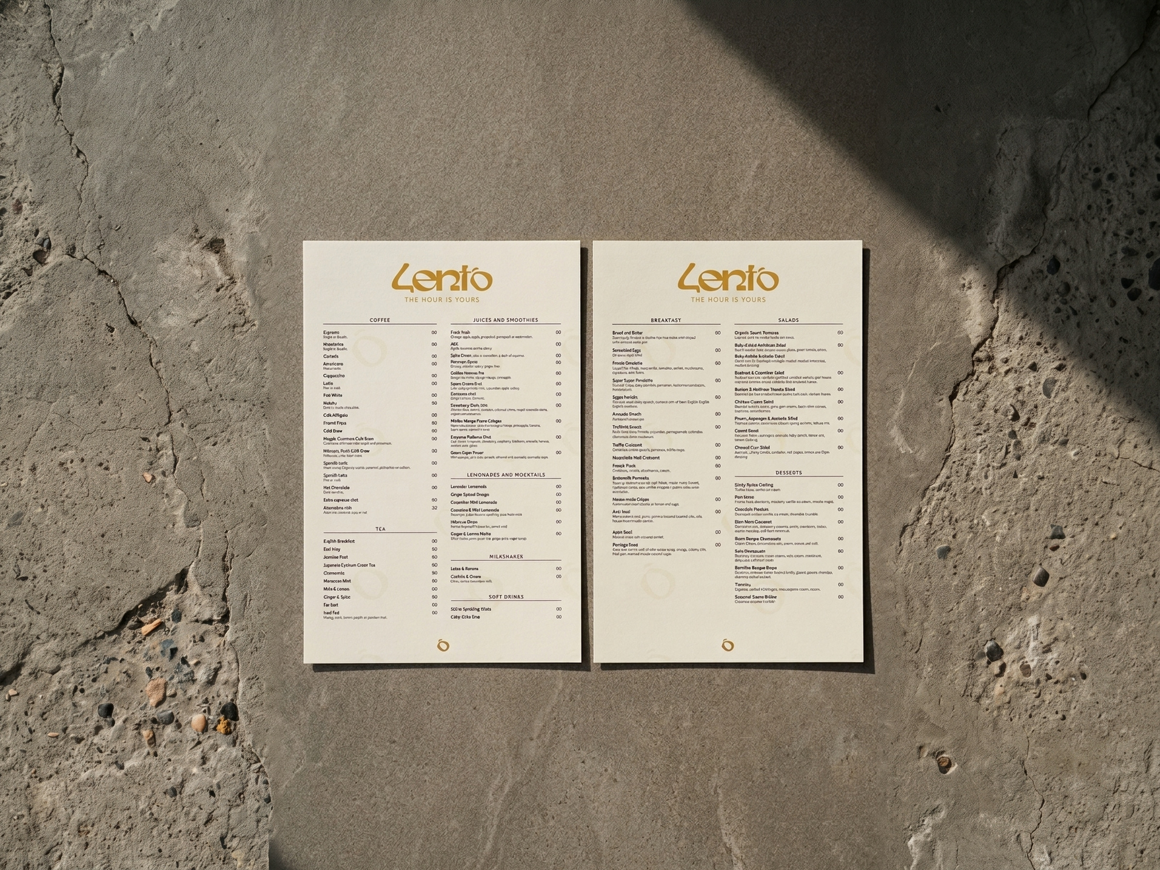 Two cream Lento menu sheets on a stone table