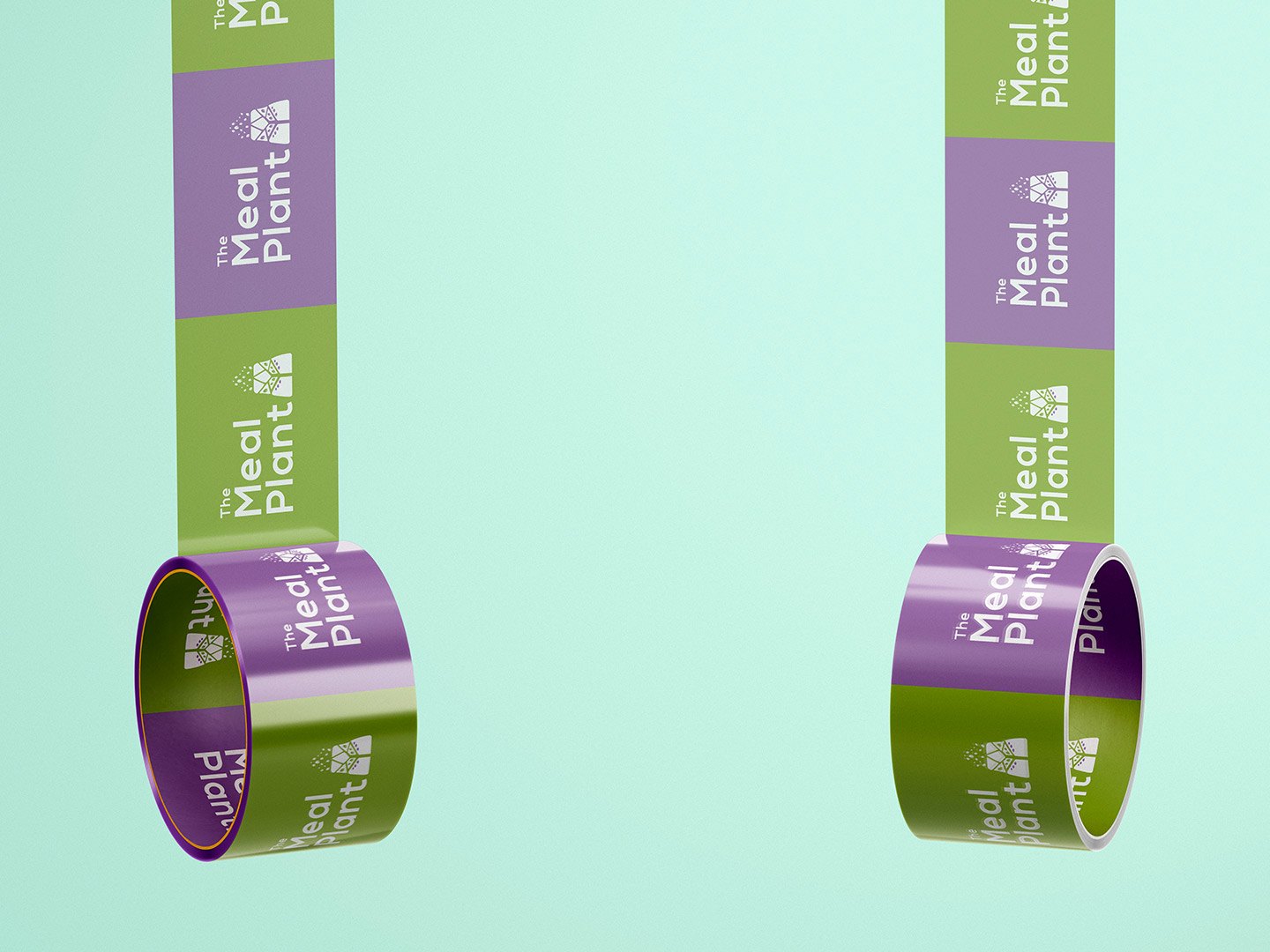 Two rolls of packing tape on mint, alternating lilac and green logo tiles